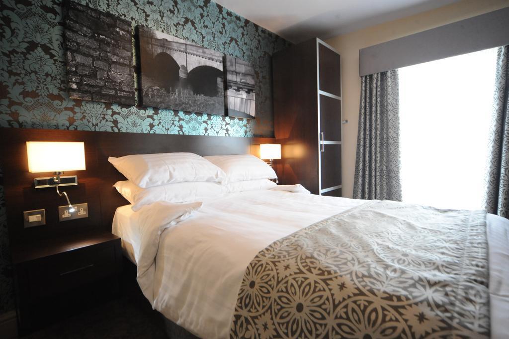 The Bull Hotel Стоуни Стратфорд Стая снимка